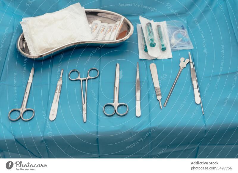 Set of sterile operating instruments surgical operate tool forceps syringe tweezers scalpel medical clinic hospital cut scissors injection pincette clamp probe