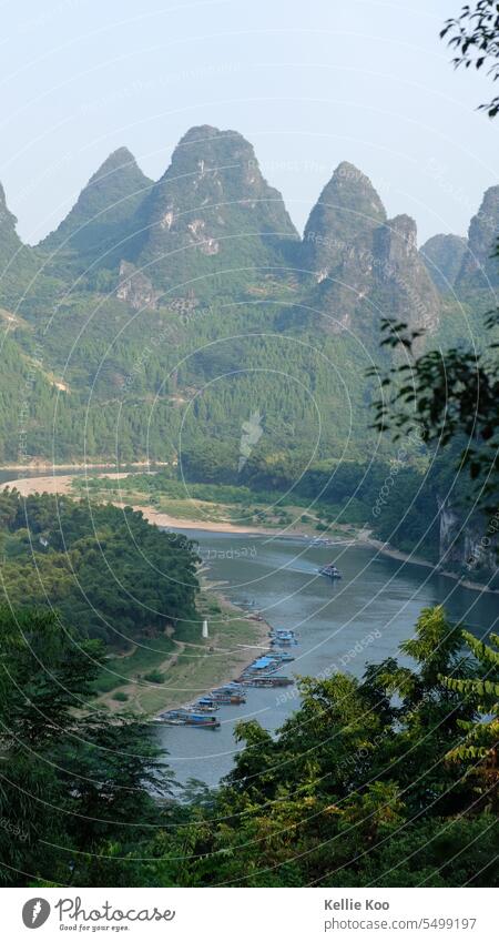 River between karst mountains Karst Mountains karst landscape riverside Riverbed river landscape Landscape quietness Nature Water boat boats Asia