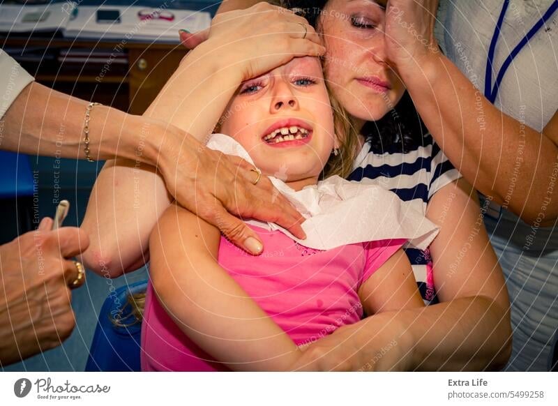 Frightened sweet little girl at dentist, dental care Care Caucasian Check Checkup Child Childhood Clinic Cry Dental Dentist Dentistry Doctor Examination