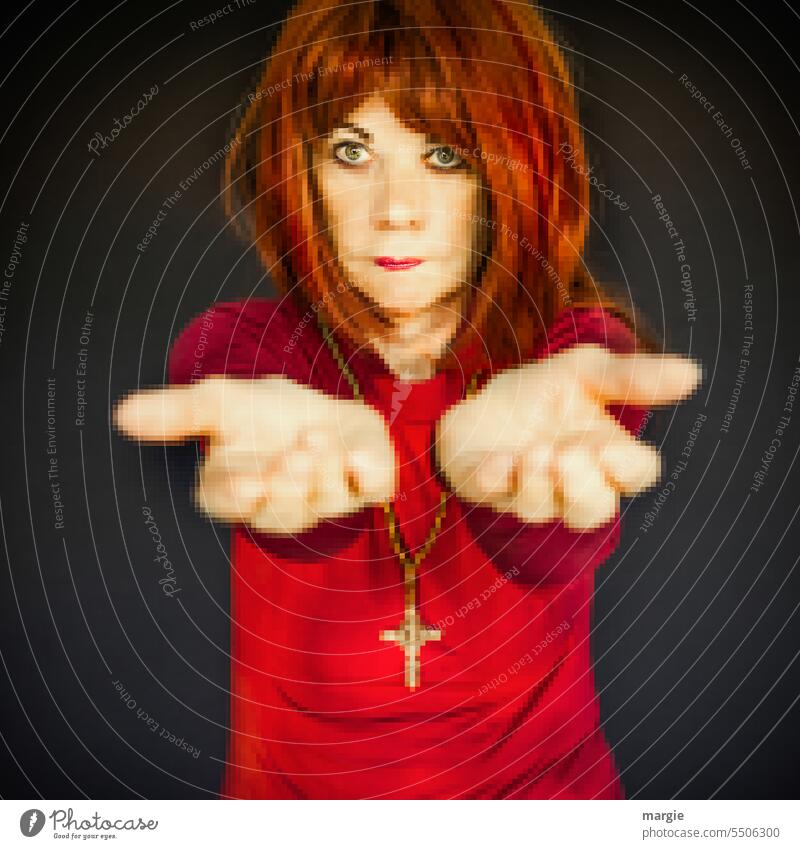 A woman asks with open hands. She wears a chain with a cross! Pixelated! Woman Red-haired Feminine Long-haired Crucifix Chain please pray Religion and faith