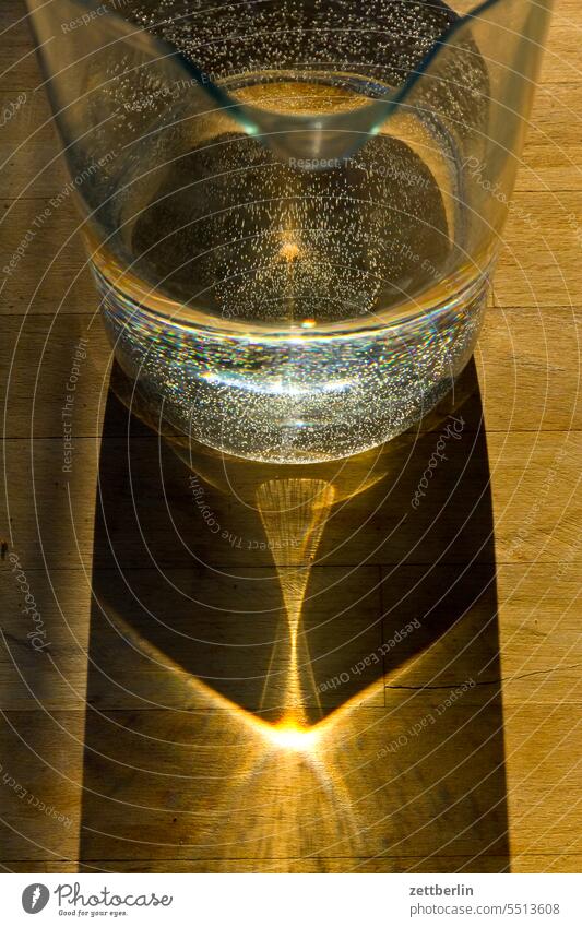 A glass of water with sun Glass Water Drinking Beverage Thirst Summer warm Warmth ardor Light Sun Refraction Breaking diffraction Optics bundling rays Table