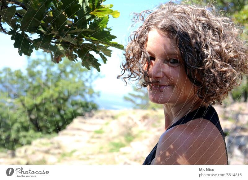 woman Attractive Intensive Authentic Emanation portrait Well-being Looking into the camera Self-confident curly-headed Happiness Joie de vivre (Vitality)