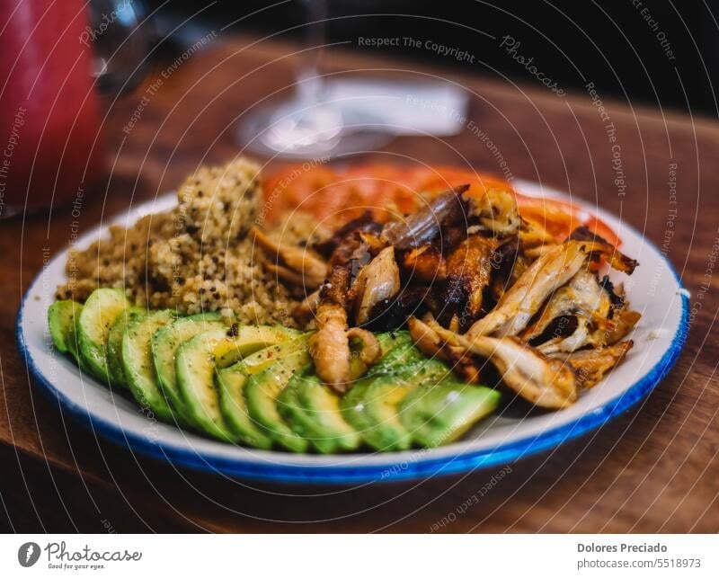 Quinoa dish with avocado, tomato and chicken appetizer background balanced bowl breast brussel colorful cuisine culinary delicious diet dinner eating fillet