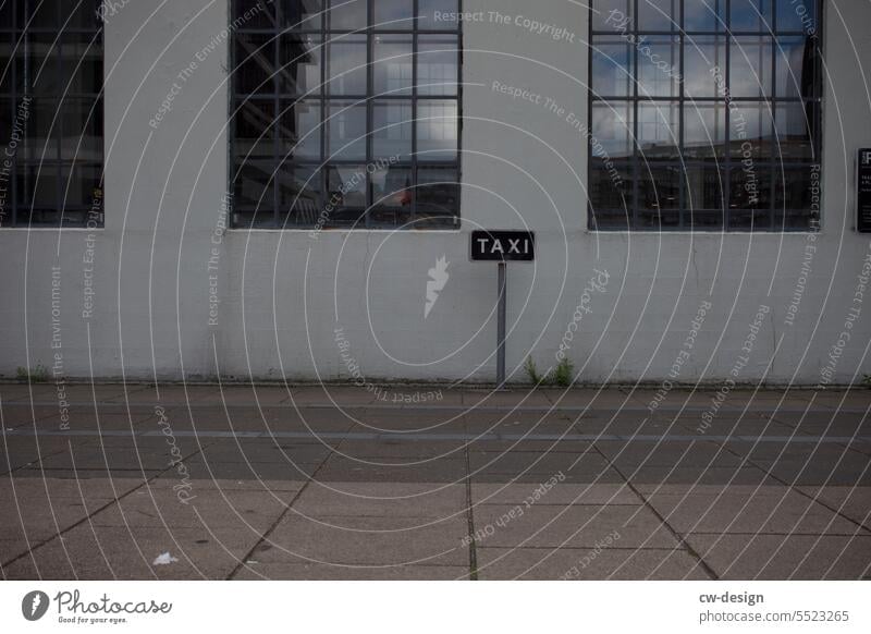 Cab parking in Aarhus Taxi Parking lot Gray Window reflection