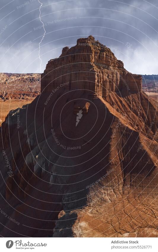 Wonderful scenery of canyon on stormy day with lightnings mountain stone national park desert overcast rough utah usa united states valley landscape america