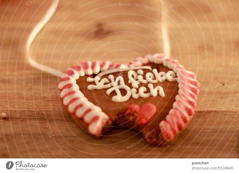 nibbled gingerbread heart with writing. i love you. love statement Gingerbread heart I love you leap Lettering Display of affection Love Declaration of love