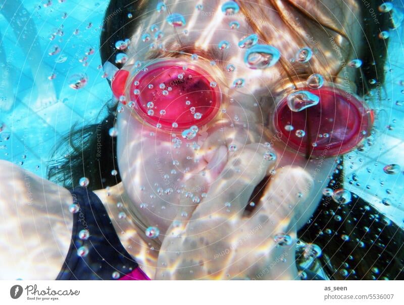 underwater Face Blow Bubble Air bubble fun Girl Joy Summer Blue Turquoise Swimsuit Swimming pool Dive Child Infancy be afloat Bathroom holidays Summer vacation