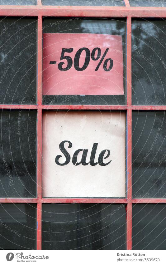 -50% sale Sale minus fifty Percent percentages Closing-down sale half prices Discount bargain Half halved sign Piece of paper Window Lattice window Business