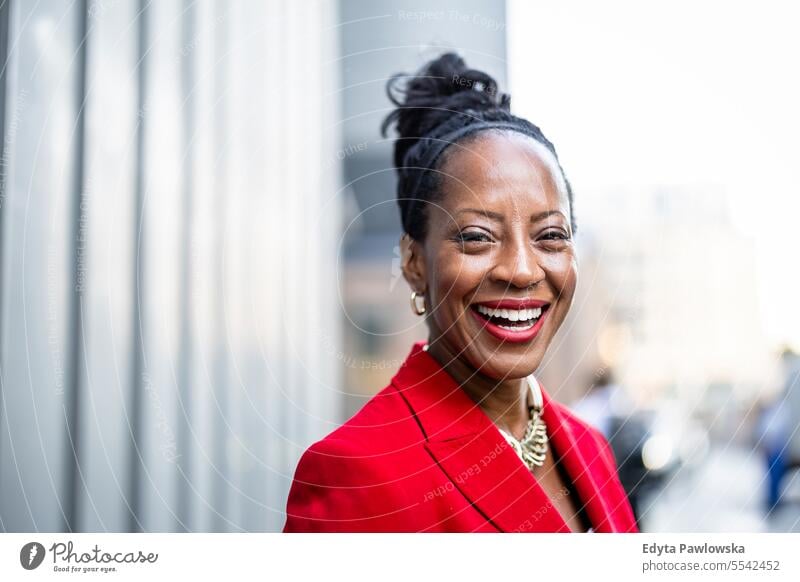 Portrait of a confident mature businesswoman in the city people downtown joy urban black natural attractive black woman happiness street happy modern