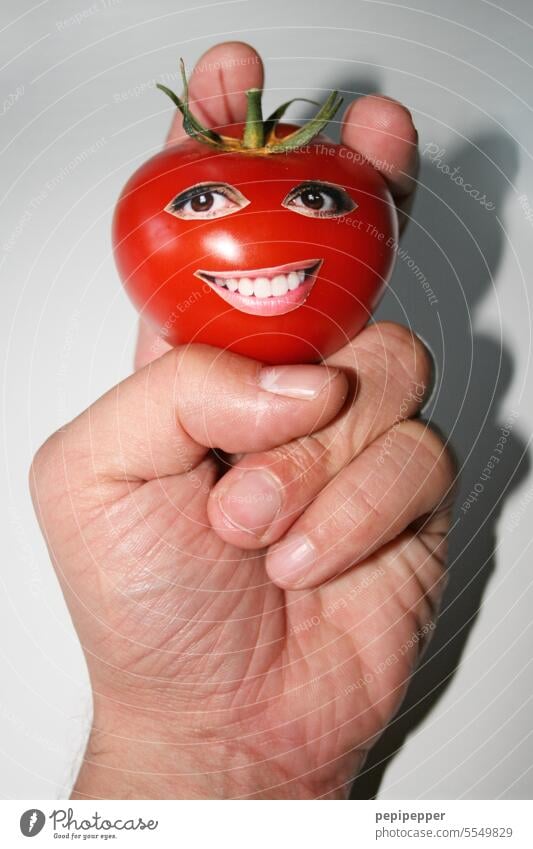 delicious tomato with glued on eyes and mouth from a magazine Food roll Bread Eating Studio shot Mouth Teeth Show your teeth color photograph food products fun