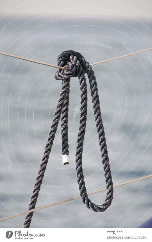 Rope Tied Up To A Knot Stock Photo, Picture and Royalty Free Image
