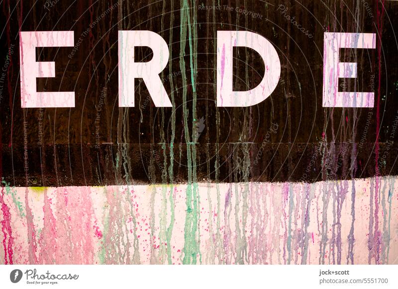 EARTH smeared Earth Word Typography Wall (building) Daub Street art Patch of colour Trashy Former Stagnating Color gradient Dye Surface Detail Graffiti German