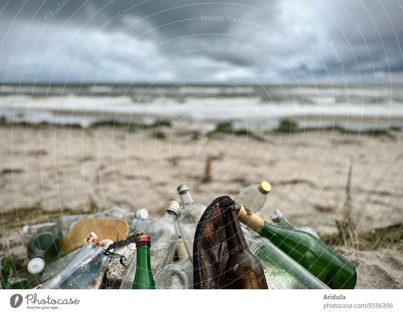 Collected garbage, especially glass bottles, on the beach of the Baltic Sea Trash amass soiling Environment waste ecology Recycling Disposal Plastic