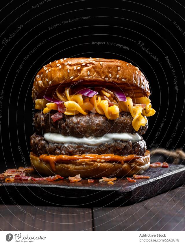 Hamburger with macaroni and cheese hamburger gourmet bun sauce meat plate serve food meal delicious tasty lunch cuisine dish dinner snack nutrition cook bread