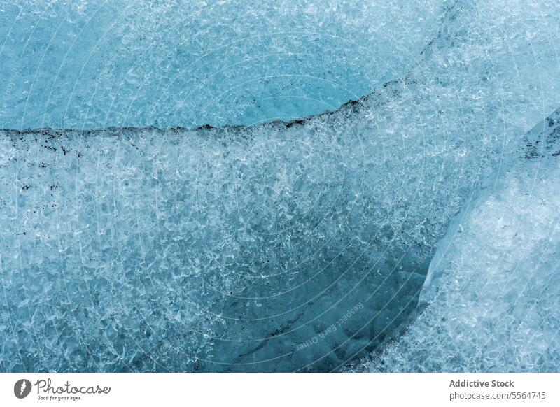 Close up of piece of ice frost cold water frozen glacier iceland seaside seashore north freeze beach nordic Jokulsarlon close up iceberg ice diamond crystal