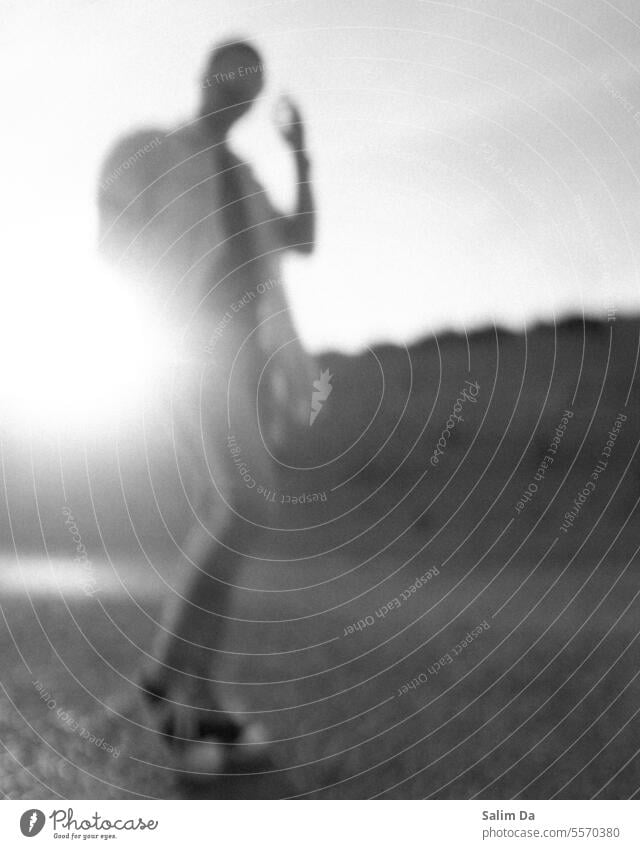 Blurry artistic black and white portrait blurred Art Black & white photo portrait photography Aesthetics Abstract aesthetic outdoors blurry motion moving