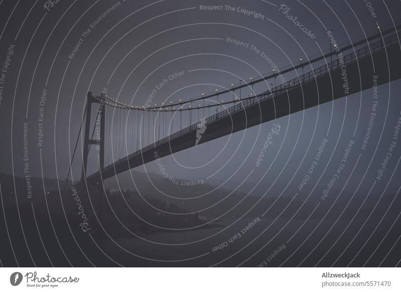 Askøy Bridge in Norway at night in fog and rain Suspension bridge Night Night sky hazy hazy weather foggy Rain Drizzle Comfortless Cold Wet Dark Colorless