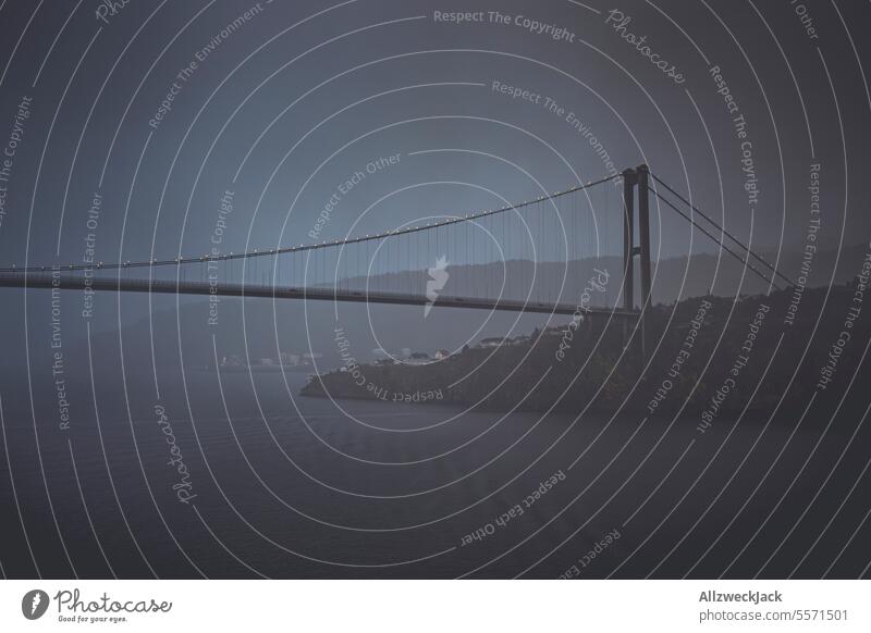 Askøy Bridge in Norway at night in fog and rain Suspension bridge Night Night sky hazy hazy weather foggy Rain Drizzle Comfortless Cold Wet Dark Colorless