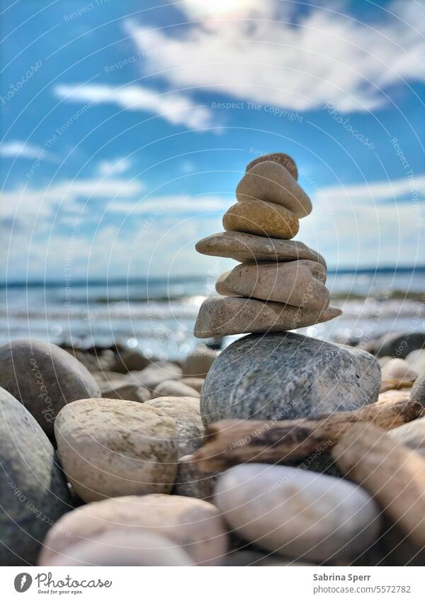 Cairns by the water Art Artistic Blue Nature stones Clouds Sky Water Light Bright cheerful Close-up Exterior shot reflection glitter magical especially