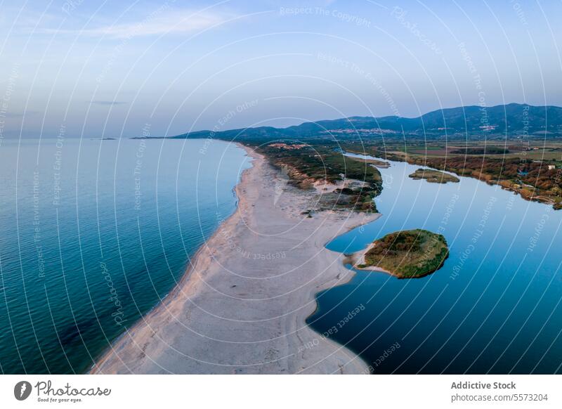 Drone view of Castelsardo coastline, Sardinia aerial view Isola Rossa Italy water sand beach sea landscape shore dune vegetation travel destination summer