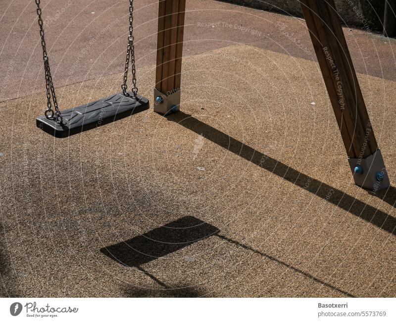 Detailed view of a children's swing in light and shadow Playground child's swing Swing To swing Infancy Playing Exterior shot Joy Joie de vivre (Vitality) Day