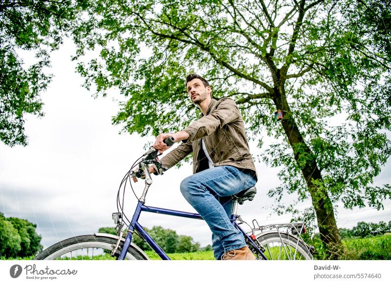 Man on the bike Cycling Eco-friendly Bicycle Nature Wheel Means of transport Lifestyle Street Environment Sustainability