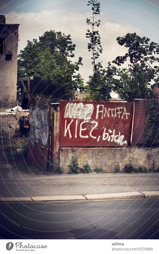 Antifa KIEZ, bitch. antifa Kiez Daub graffiti Industrial wasteland sprayed embassy policy Message Text Fence Goal Highway ramp (entrance) Derelict
