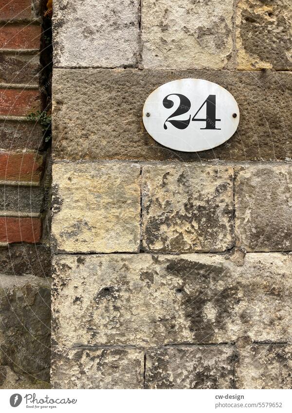 24 House number Digits and numbers Wall (building) Colour photo Signs and labeling