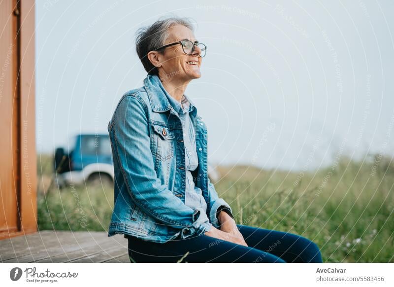Senior smiling woman going on a trip after retiring, resting while looking at the magnificent sights mental health retirement female lifestyle caucasian senior