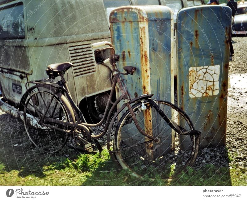 Somewhat rusty Bicycle Scrap metal Petrol pump Broken Retro Old-school Rust bulli T1 wheel scrap iron gasoline