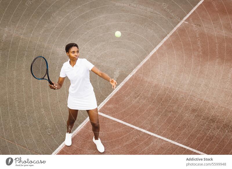 Young beautiful woman playing tennis match active lifestyle activity amateur athlete ball beautiful women cheerful competition court enjoyment exercise