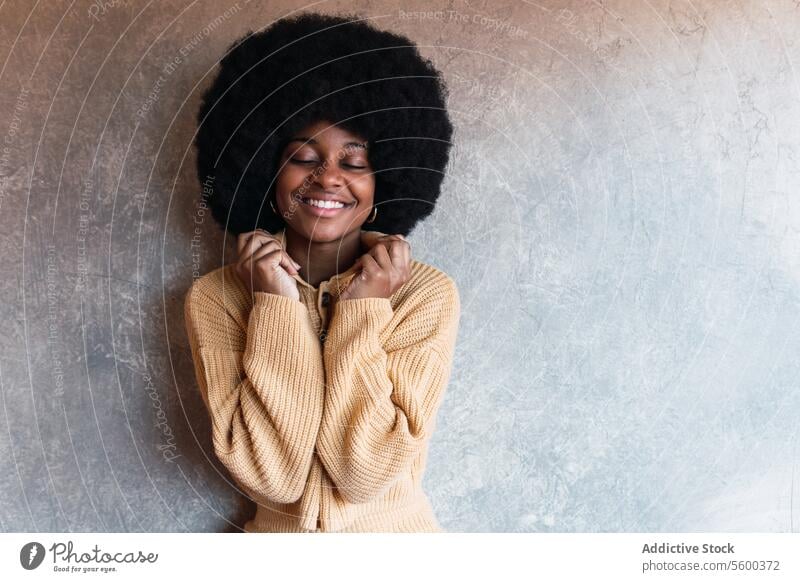 Smiling black woman with closed eyes a Royalty Free Stock Photo