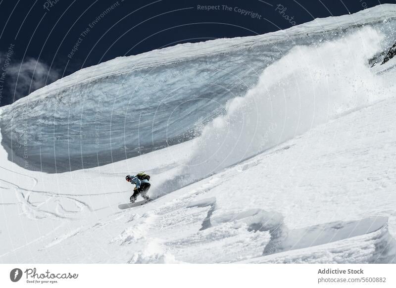 Unrecognizable person skiing on snow mountain during vacation at Swiss Alps during sunny day skier enjoy winter covering swiss alps unrecognizable white