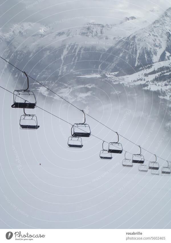 Chairlift in the fog - a Royalty Free Stock Photo from Photocase