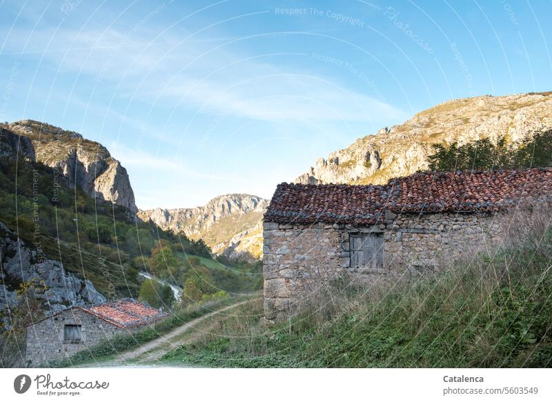 Mountain landscape with old stone houses Day Summer daylight Beautiful weather Nature Environment Rock Sky mountains Peak Landscape Clouds Vacation & Travel