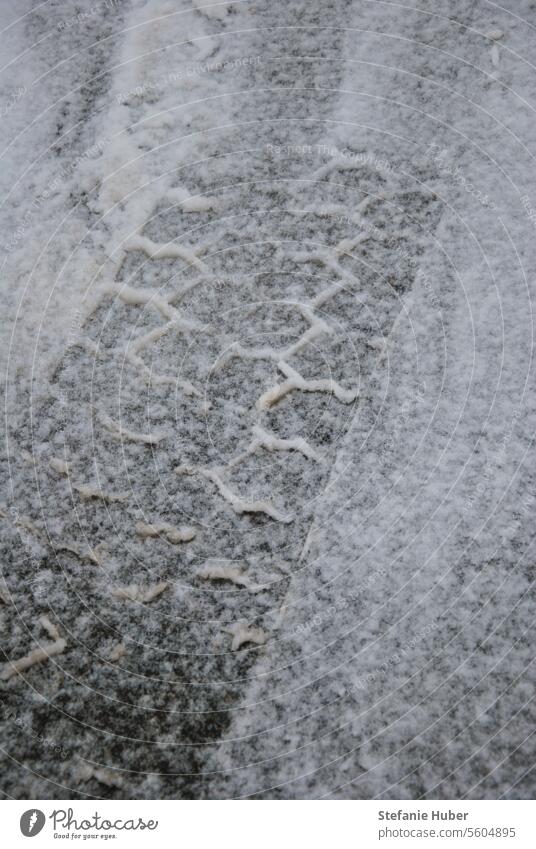 Tire tracks in the snow trace Snow track Street Winter winter tyre track Snow relief