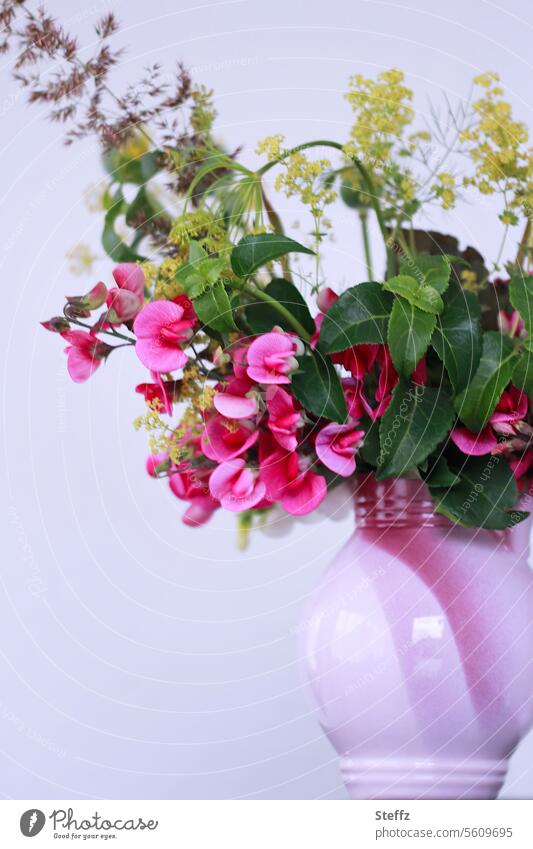 Bouquet of flowers from the garden in a purple jug Summerflower Summer flowers bouquet Garden plants Vase Water jug Vase with flowers garden flowers Picked