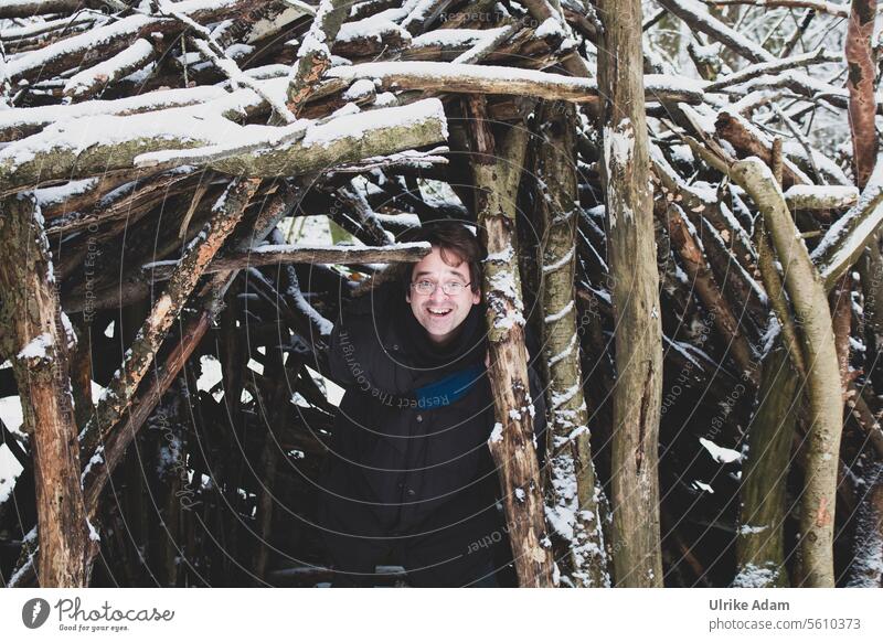 Forest cave made from tree trunks Man Cave Snow