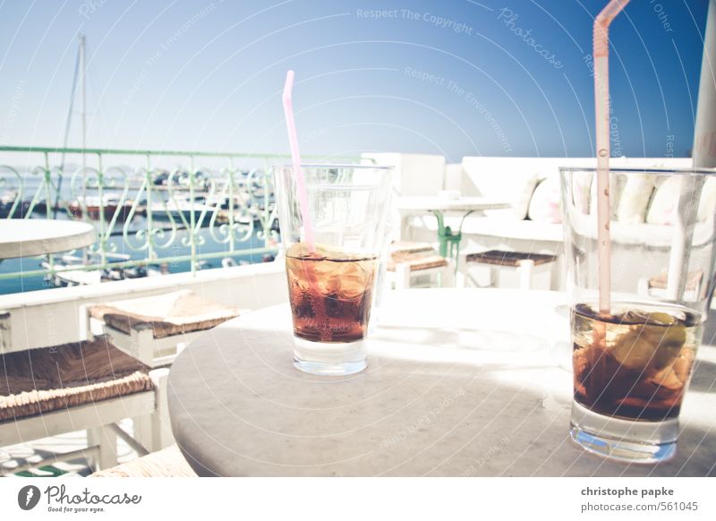 Two cold, caffeinated soft drinks, please! Beverage Cold drink Lemonade Cola Glass Straw Contentment Vacation & Travel Trip Summer Summer vacation Sun Ocean