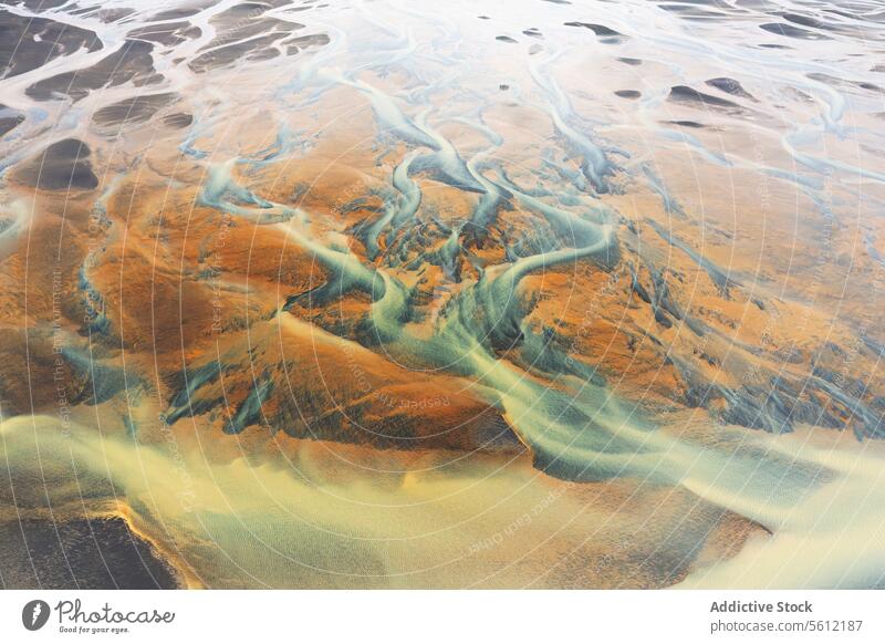 Aerial sediment patterns in an Icelandic river basin iceland aerial view abstract nature landscape earth water detail texture geography geomorphology