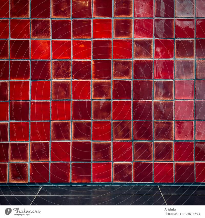 Glossy red tiled wall with black floor tiles Tile Wall (building) Red splendour Pattern Structures and shapes Mosaic Architecture Sharp-edged Abstract Detail