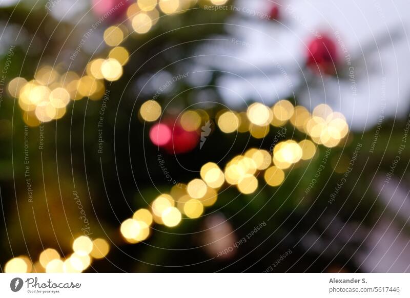 Bokeh of a Christmas tree detail with fairy lights and red Christmas tree baubles Christmas & Advent Christmas decoration fir tree Decoration