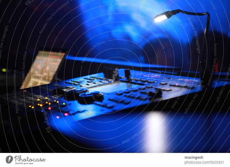 Detailed view of a mixing console in a club mixer Nightclub Night life Disco Discotheque Party Club Music Light Entertainment Dance Clubbing Event