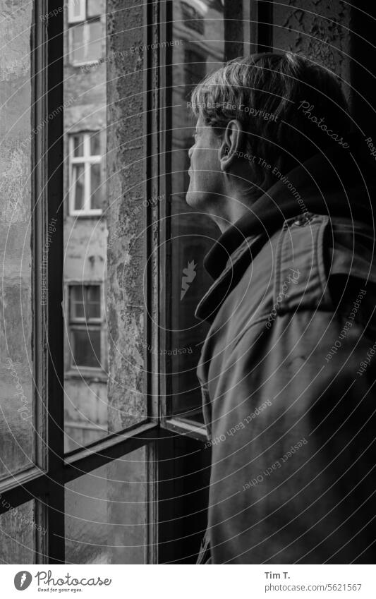Man in the stairwell Prenzlauer Berg Window b/w Staircase (Hallway) Black & white photo Berlin Downtown Town Capital city Day Old town bnw Interior shot