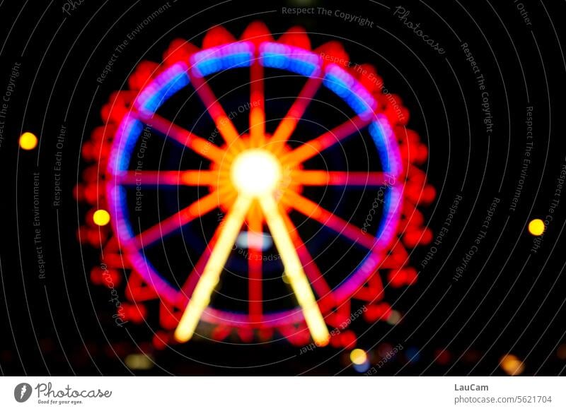 Ferris wheel - also blurred to recognize variegated luminescent Round darkness ride Fairs & Carnivals Christmas Fair Attraction Movement Theme-park rides