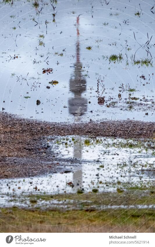 Dortmund television tower reflected in a puddle Television tower Architecture Town Tourist Attraction Downtown Tall reflection Broacaster broadcasting tower