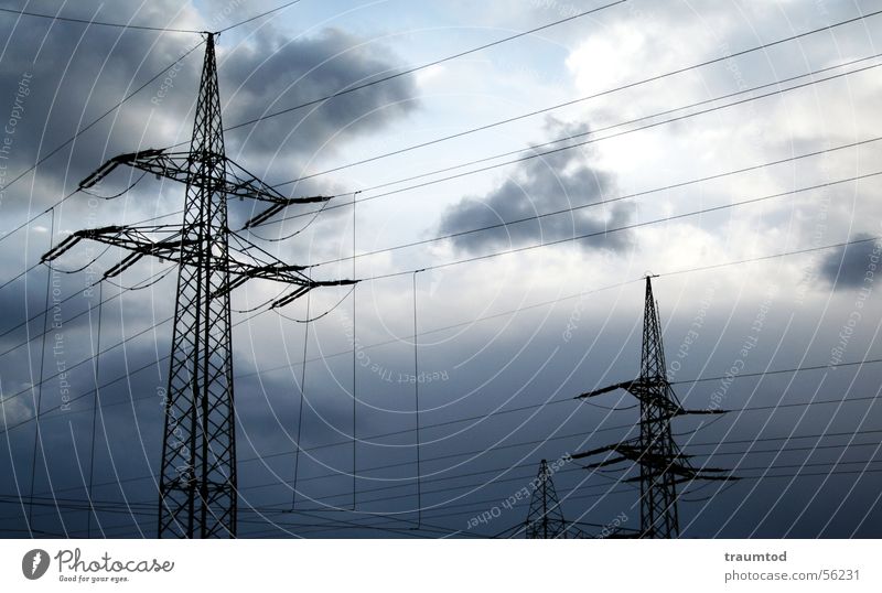 Opening. Electricity pylon Steel Strong High-power current Clouds Rain Transmission lines Sky Industrial Photography industrial Mud flats Cable Blue Sun Nature