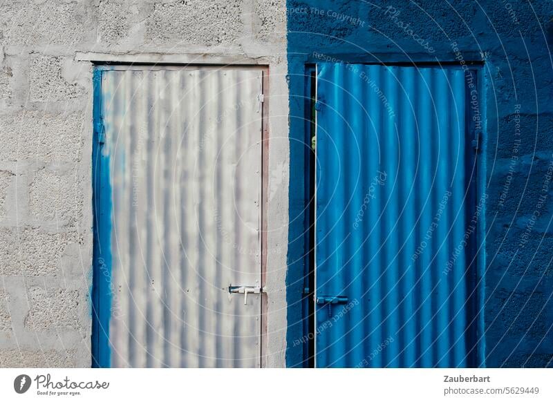 Two corrugated sheet metal doors in white and blue in the same walls Corrugated sheet iron Entrance Way out White Blue Closed Front door Wait Access obstructed