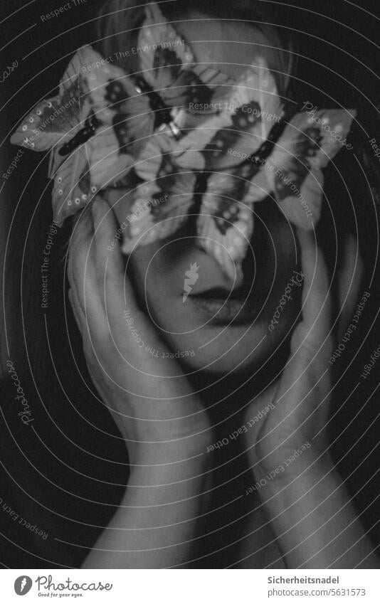 Butterflies cover the face Butterfly portrait Black & white photo blurriness Sadness Captured Distress Loneliness Fear Dark Grief Concern Exhaustion Pain