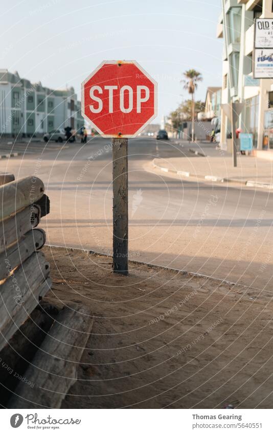 Read the signs Stop sign Road sign Signage Red Warning sign Traffic infrastructure Colour photo Town Signs and labeling Transport Street Safety Motoring